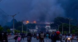 Demonstrators set fire to the Parliament building in Kathmandu. (Photo by Ambir Tolang / NurPhoto via AFP)