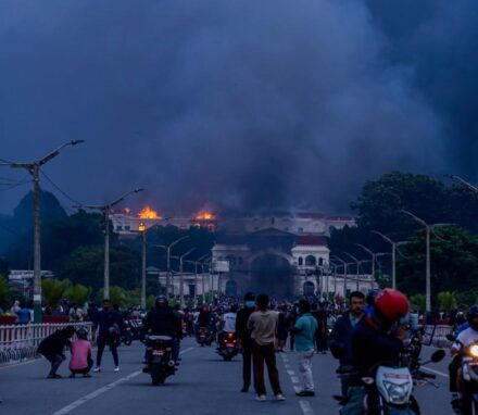 Demonstrators set fire to the Parliament building in Kathmandu. (Photo by Ambir Tolang / NurPhoto via AFP)