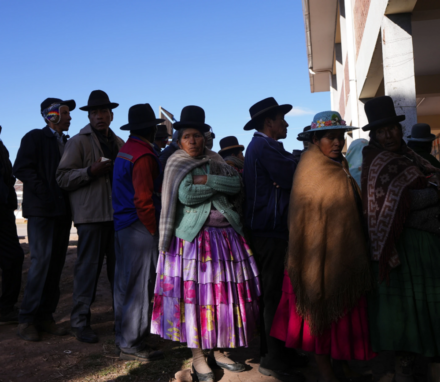 Voters stand in line at a polling station during general elections in Jesus de Machaca, Bolivia, Sunday, Aug. 17, 2025. (AP Photo/Juan Karita)