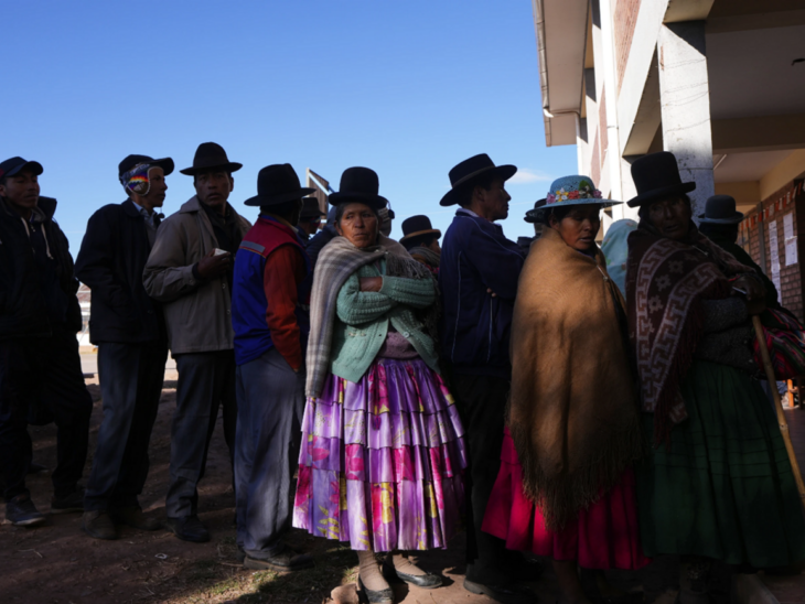 Voters stand in line at a polling station during general elections in Jesus de Machaca, Bolivia, Sunday, Aug. 17, 2025. (AP Photo/Juan Karita)
