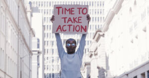 A young activist calling for equality, justice and human rights in South Africa. © Armand Burger