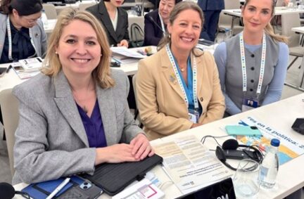 Rt Hon Dame Karen Bradley DBE MP, Helen Maguire MP and Rosie Wrighting MP at UK desk in the conference plenary