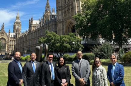 Delegation pictured on College Green in front of the Palace of Westminster