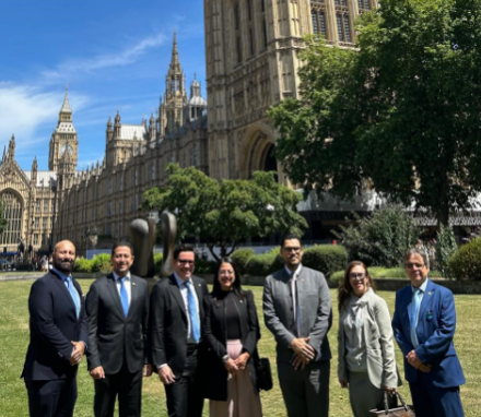 Delegation pictured on College Green in front of the Palace of Westminster