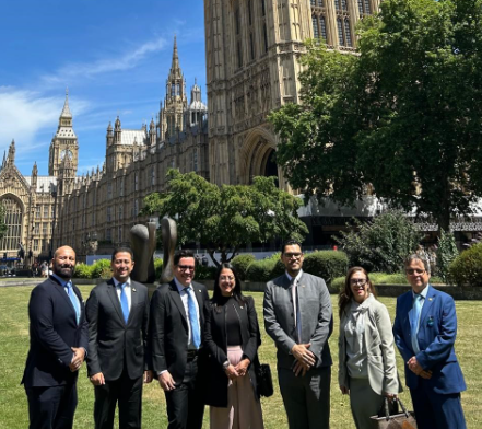 Delegation pictured on College Green in front of the Palace of Westminster